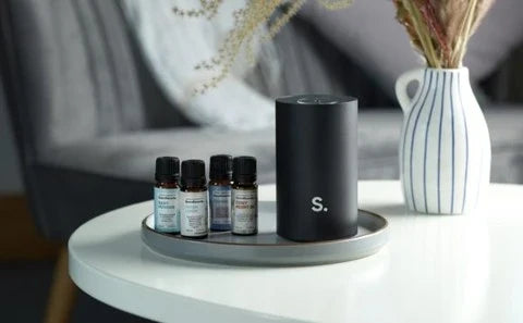 The Halo in use in a living room — consistent, room-filling fragrance without a flame in sight